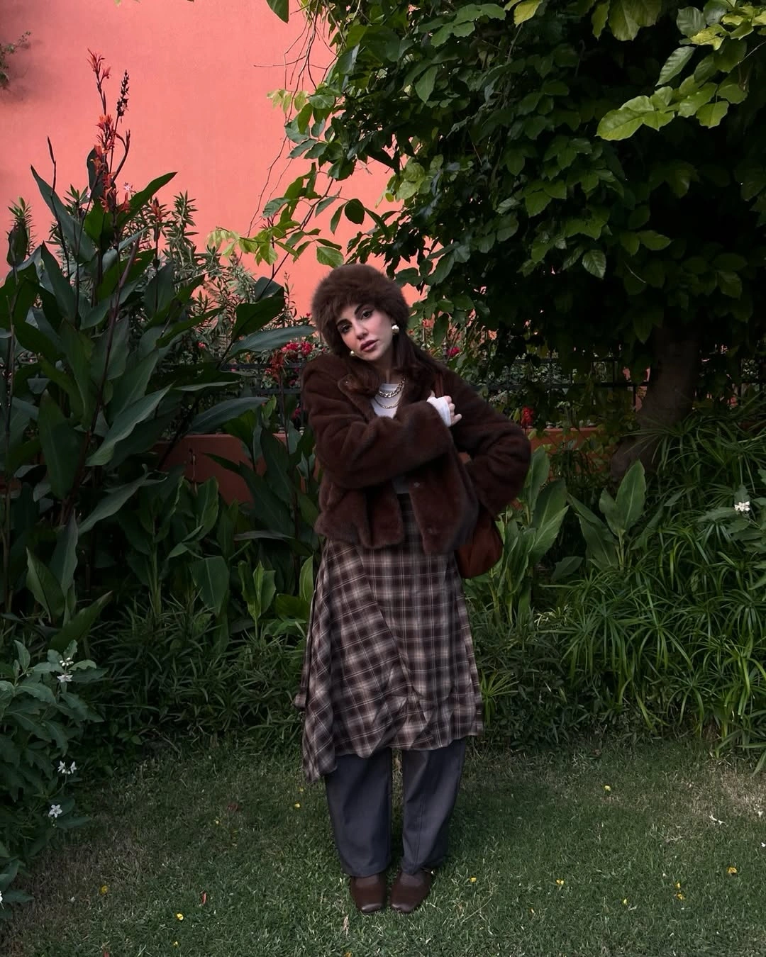 Brown plush jacket with checked long skirt and brown boots