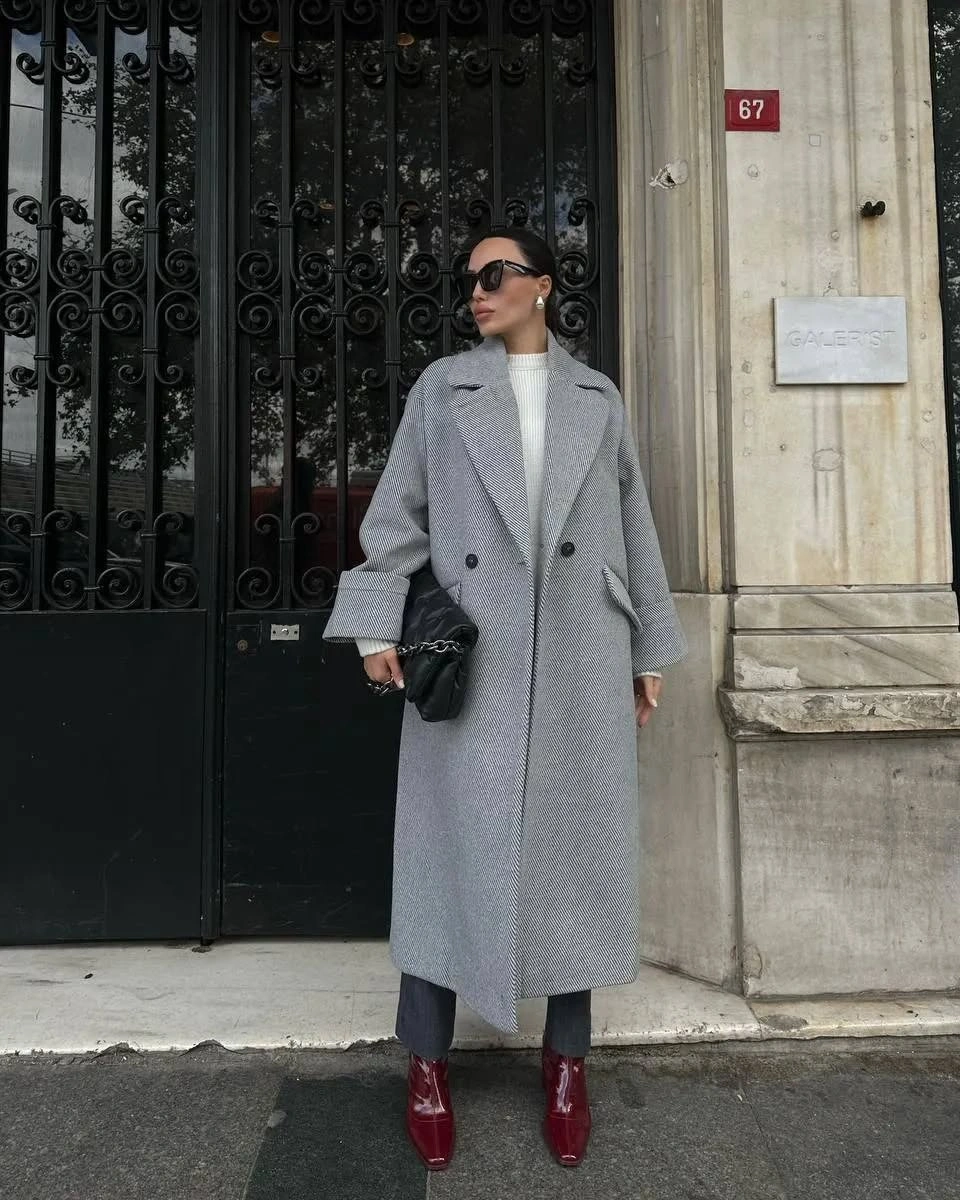 Pale gray double-breasted coat with red shoes
