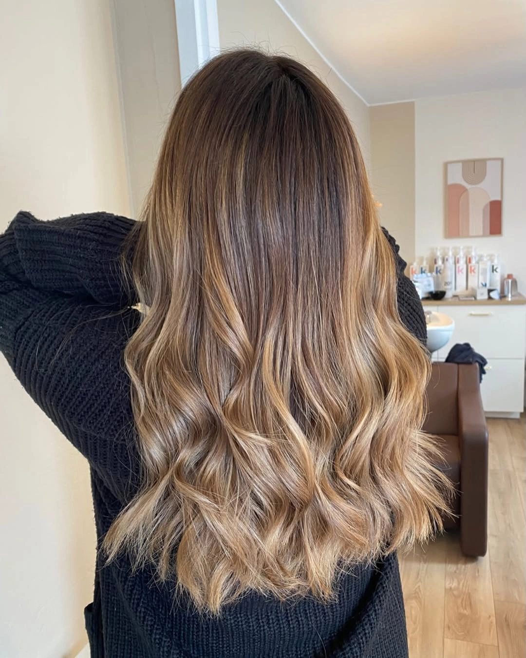 Medium long honey beige wavy hair from back
