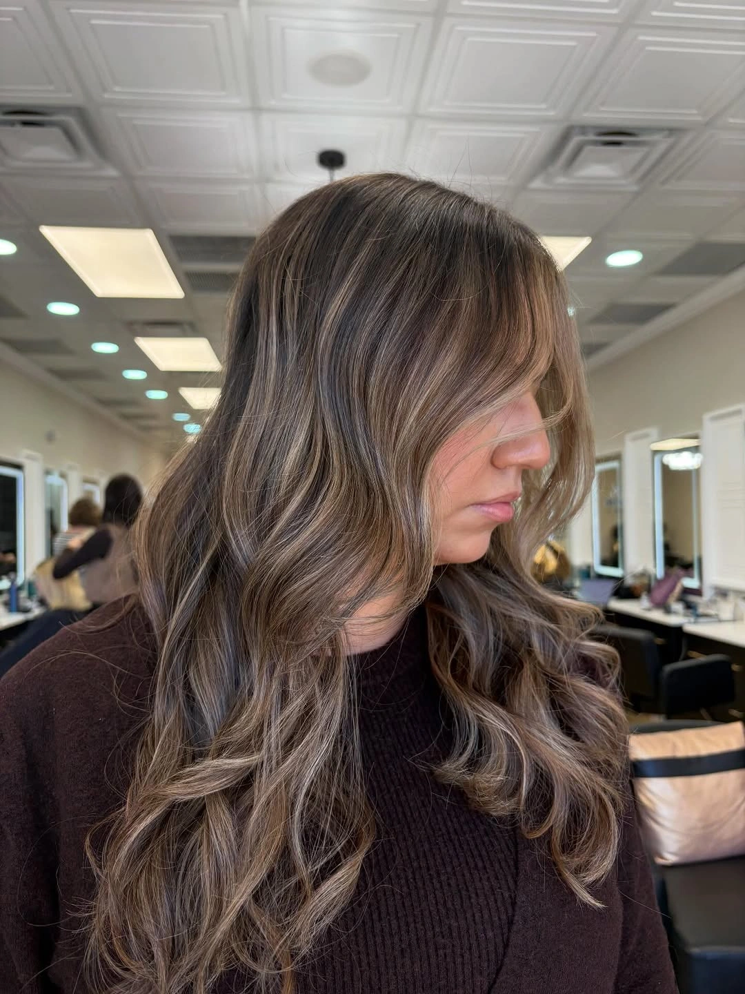 Medium brunette waves with taupe pieces and curtain front