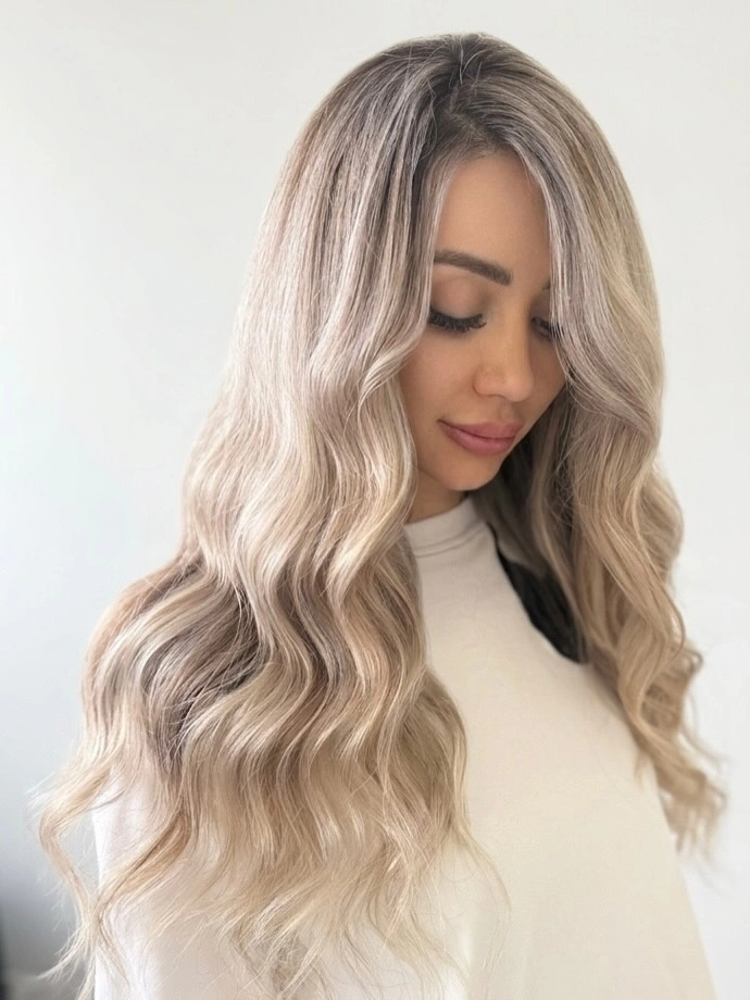 Medium pale beige blonde waves from front side