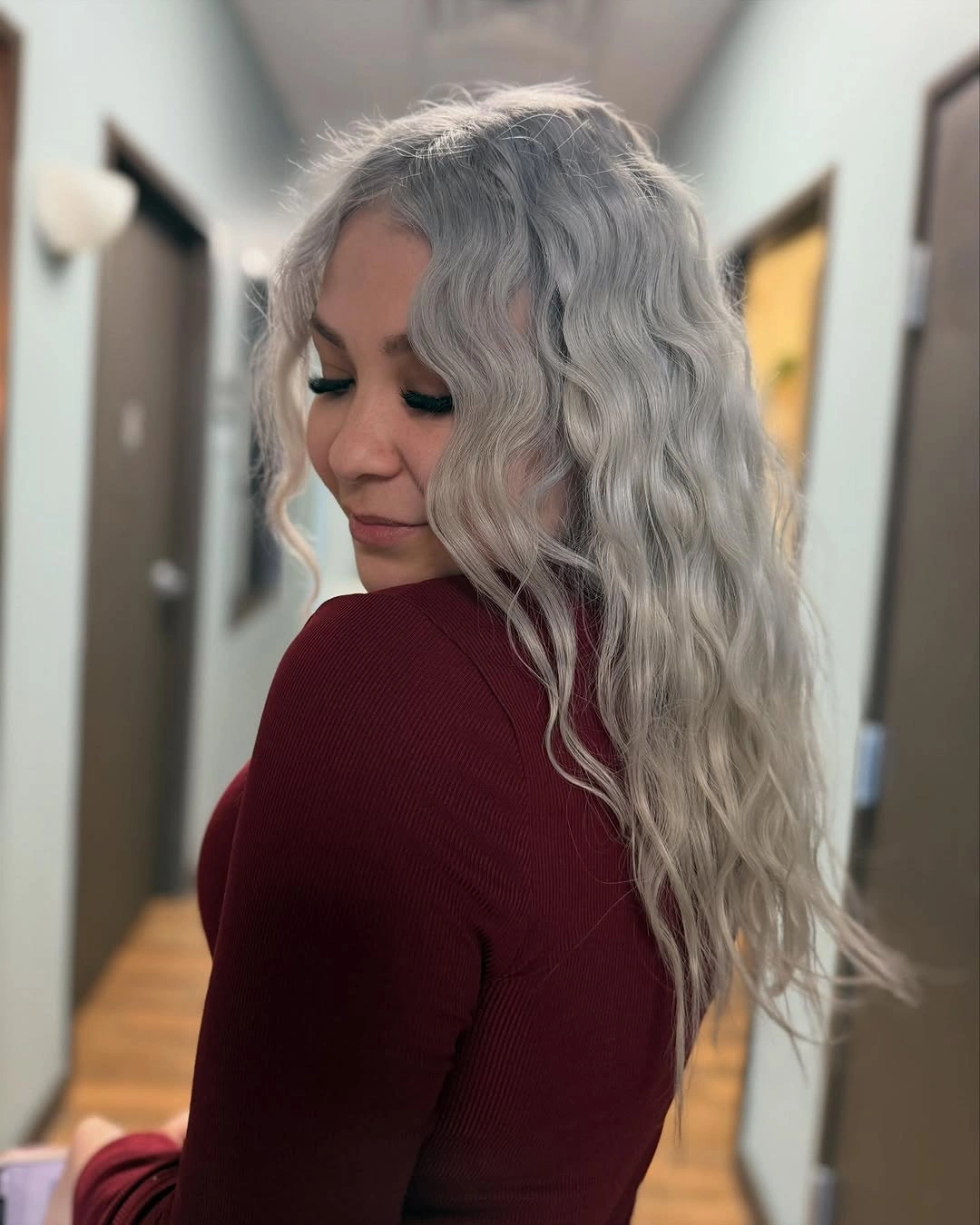 Long silver grey wavy hair with pale ends