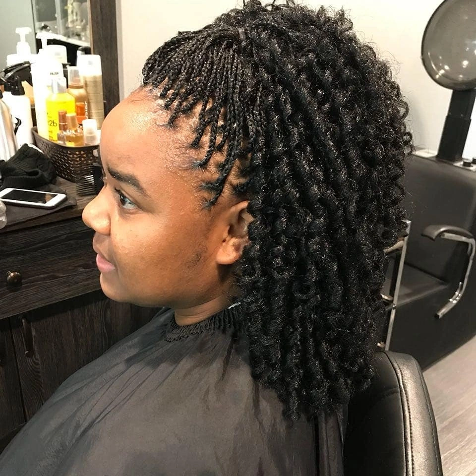 Black twisted sections with shorter front pieces and longer back
