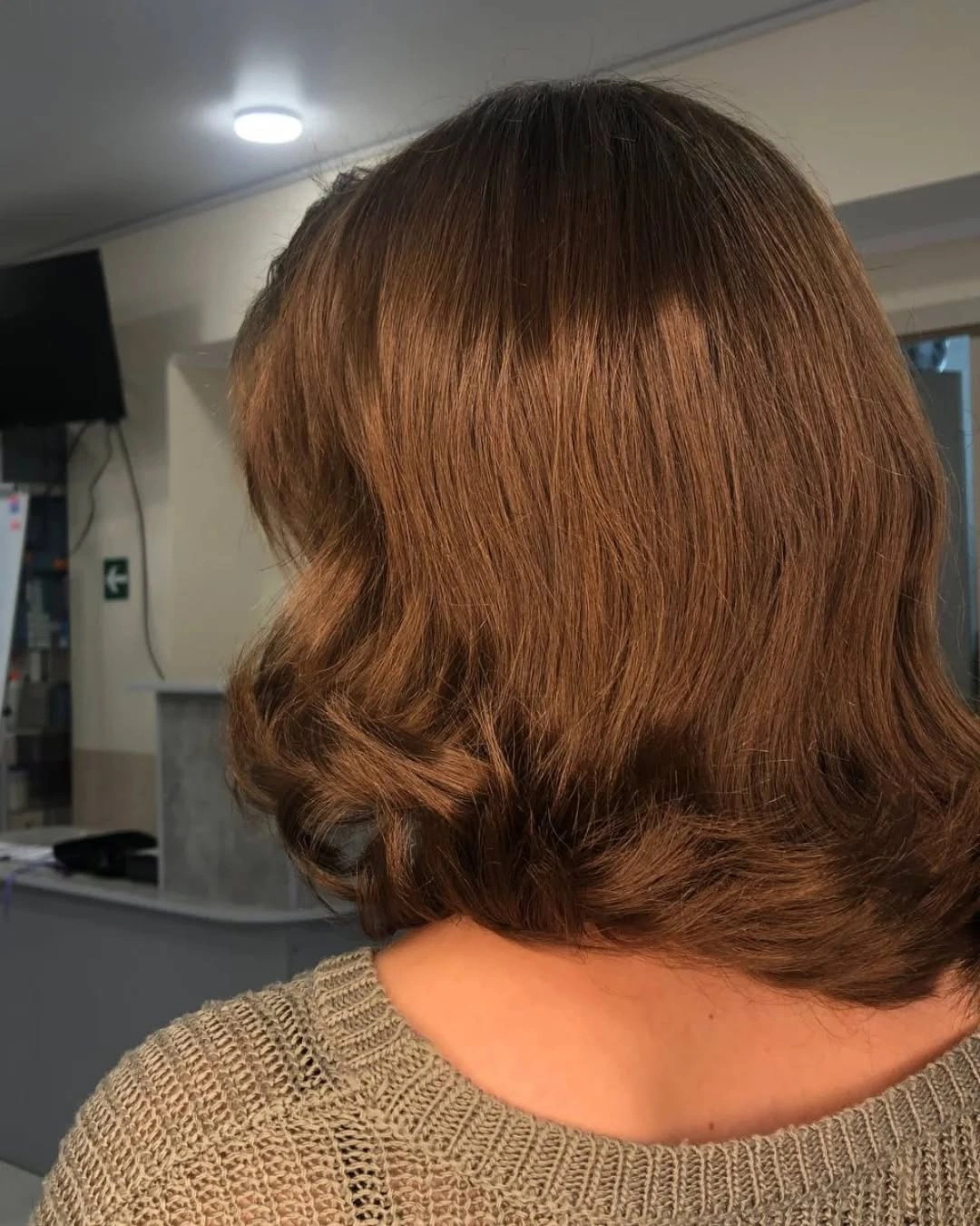 Brown shoulder-length hair with rounded back and soft curled ends