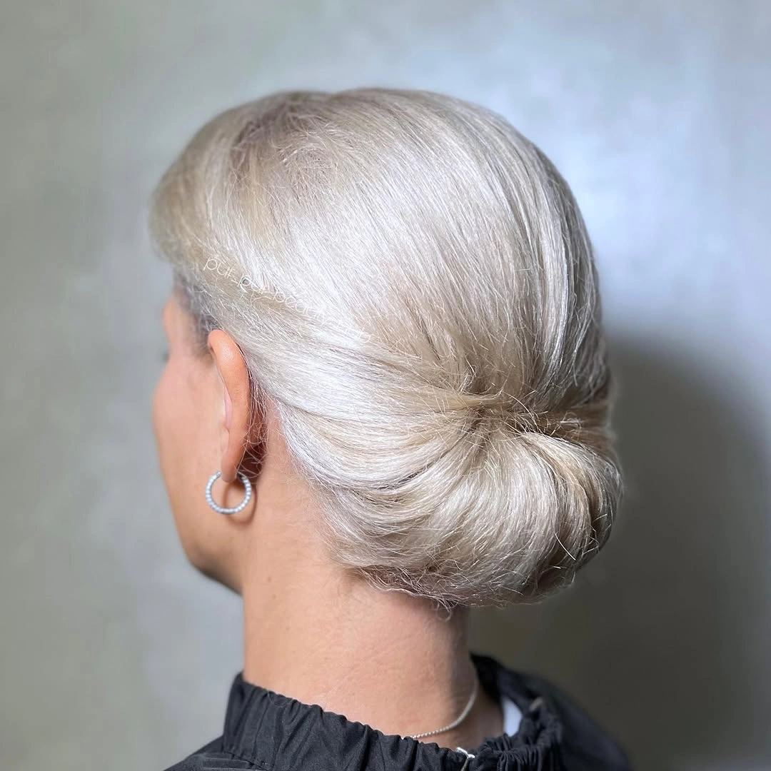 White silver low bun viewed from the back