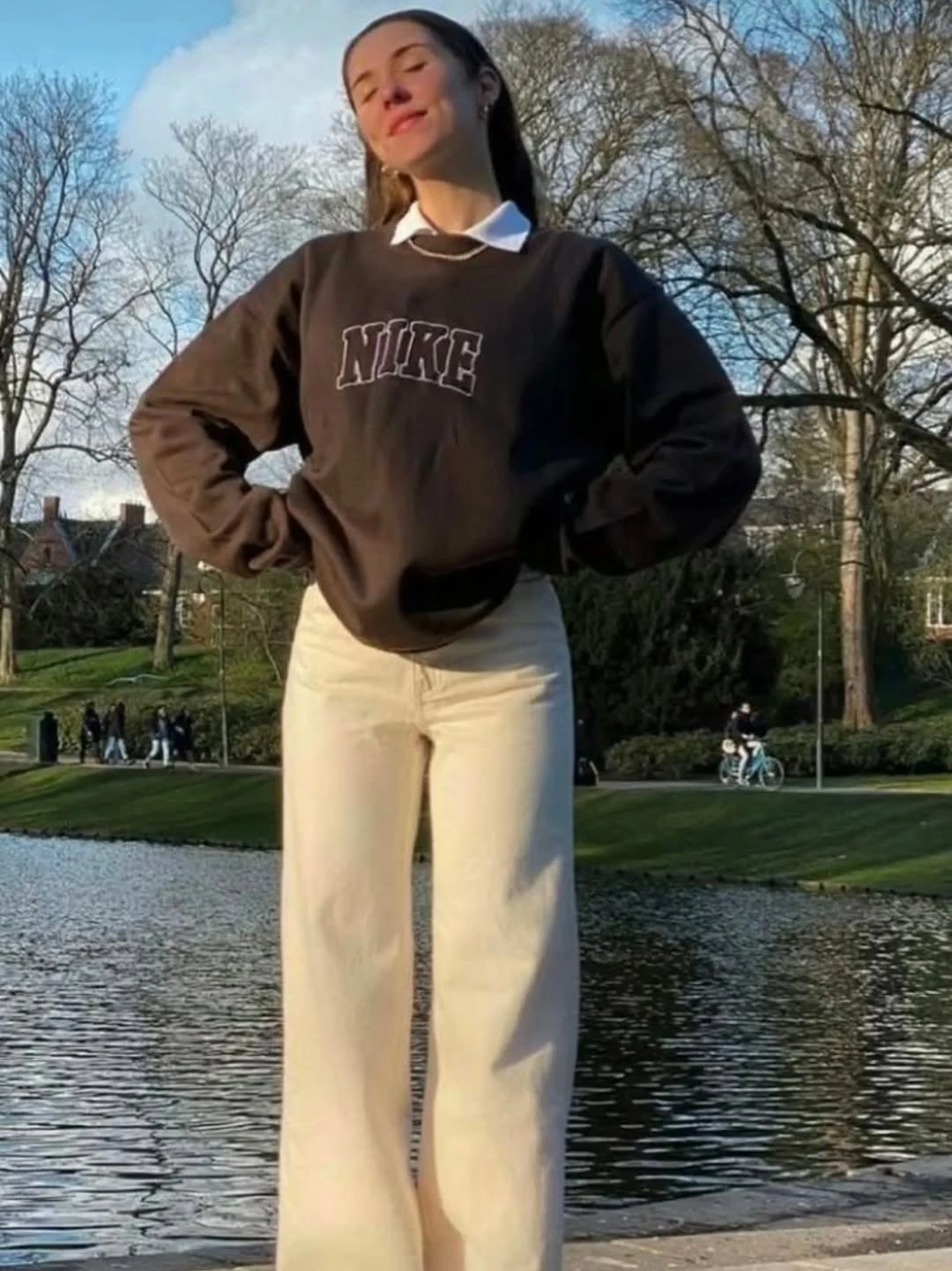 Dark logo sweatshirt with collar and pale pants
