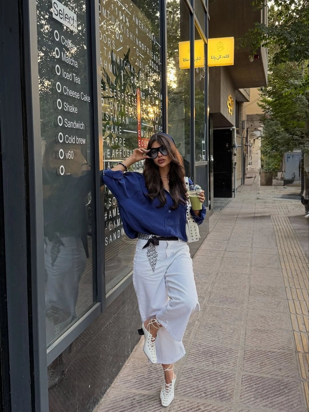 Blue oversized shirt with white cropped wide pants