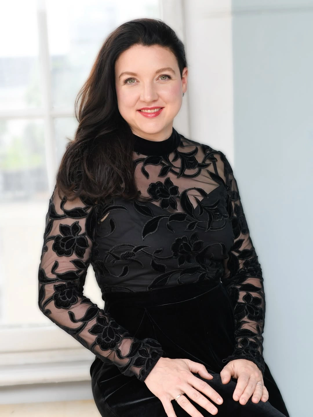 Black sheer floral top with dark lower piece