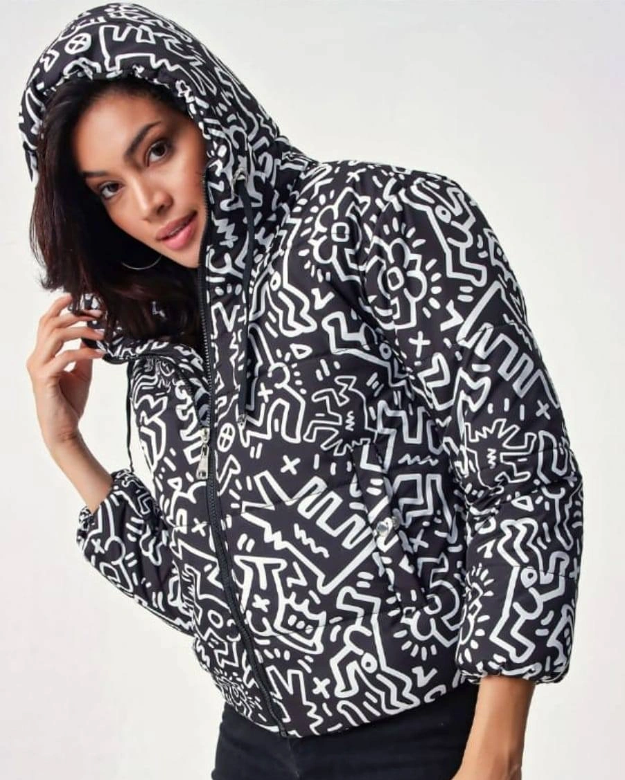 Black hooded puffer with white allover abstract print