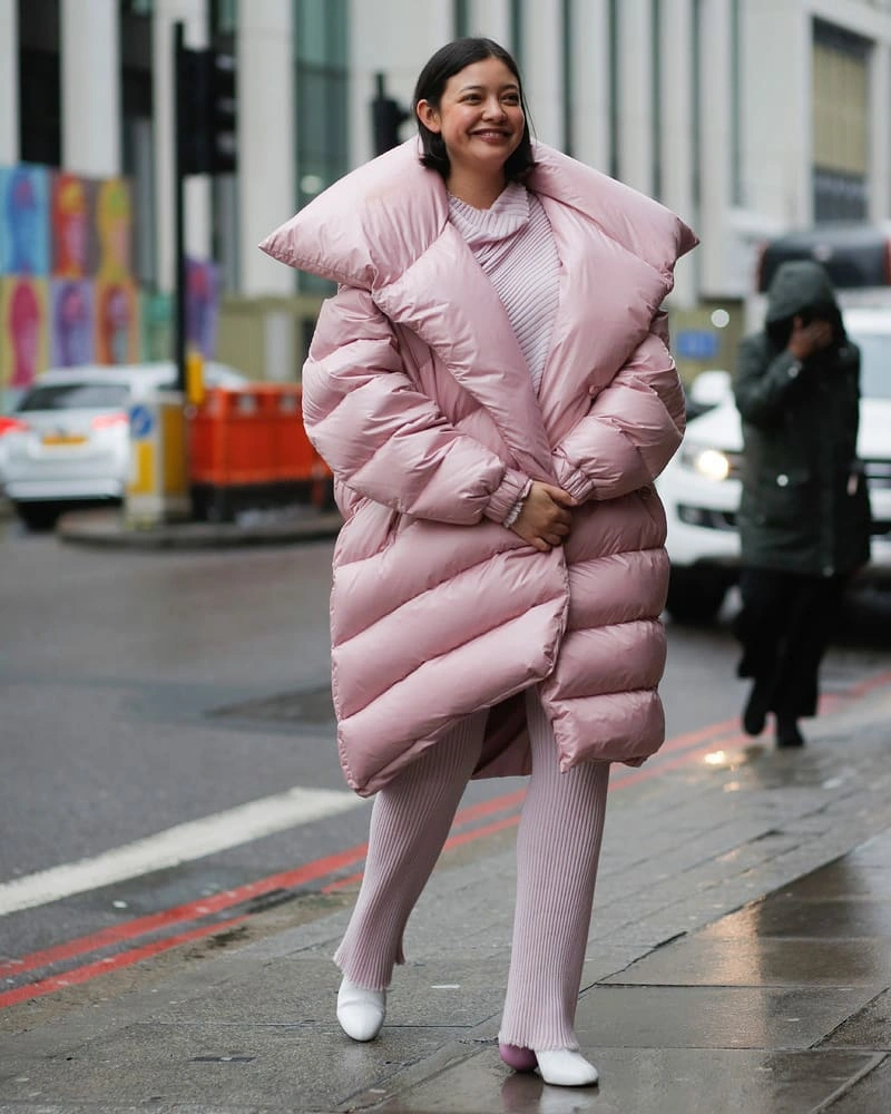 Oversized pale pink puffer over tonal ribbed outfit