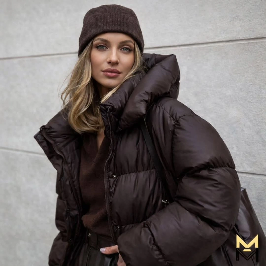 Dark brown puffer with raised collar and brown beanie