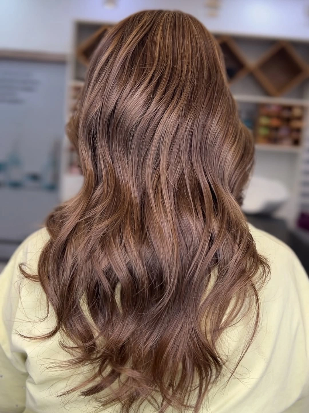 Long mushroom-brown waves with subtle taupe and beige dimension