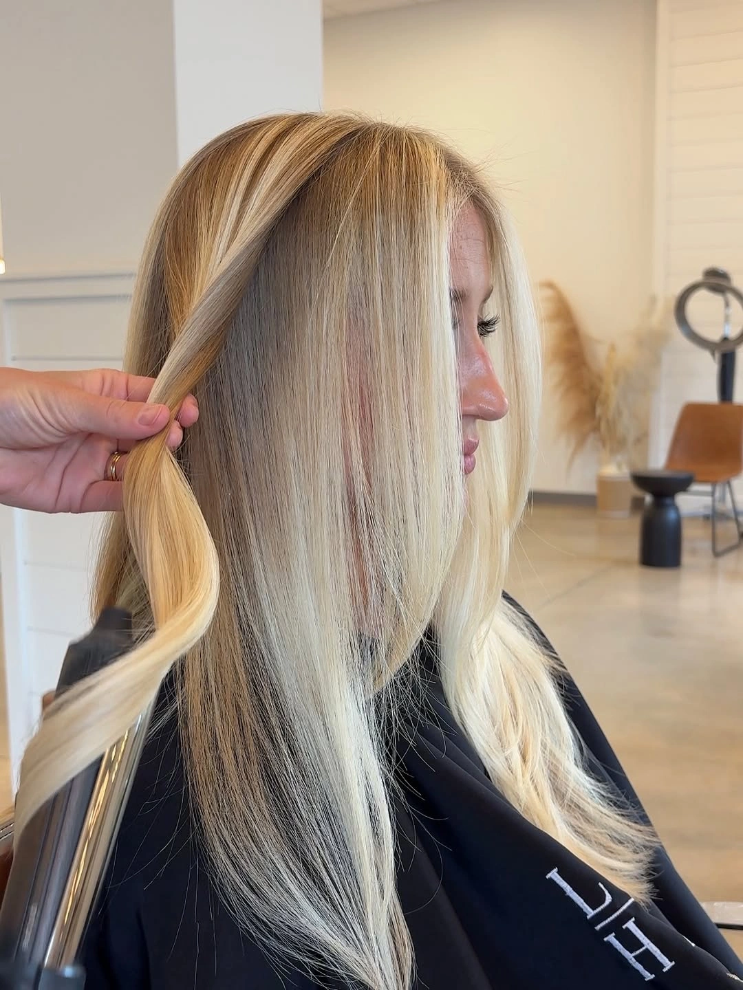 Long straight blonde hair with pale front and dark underlayer
