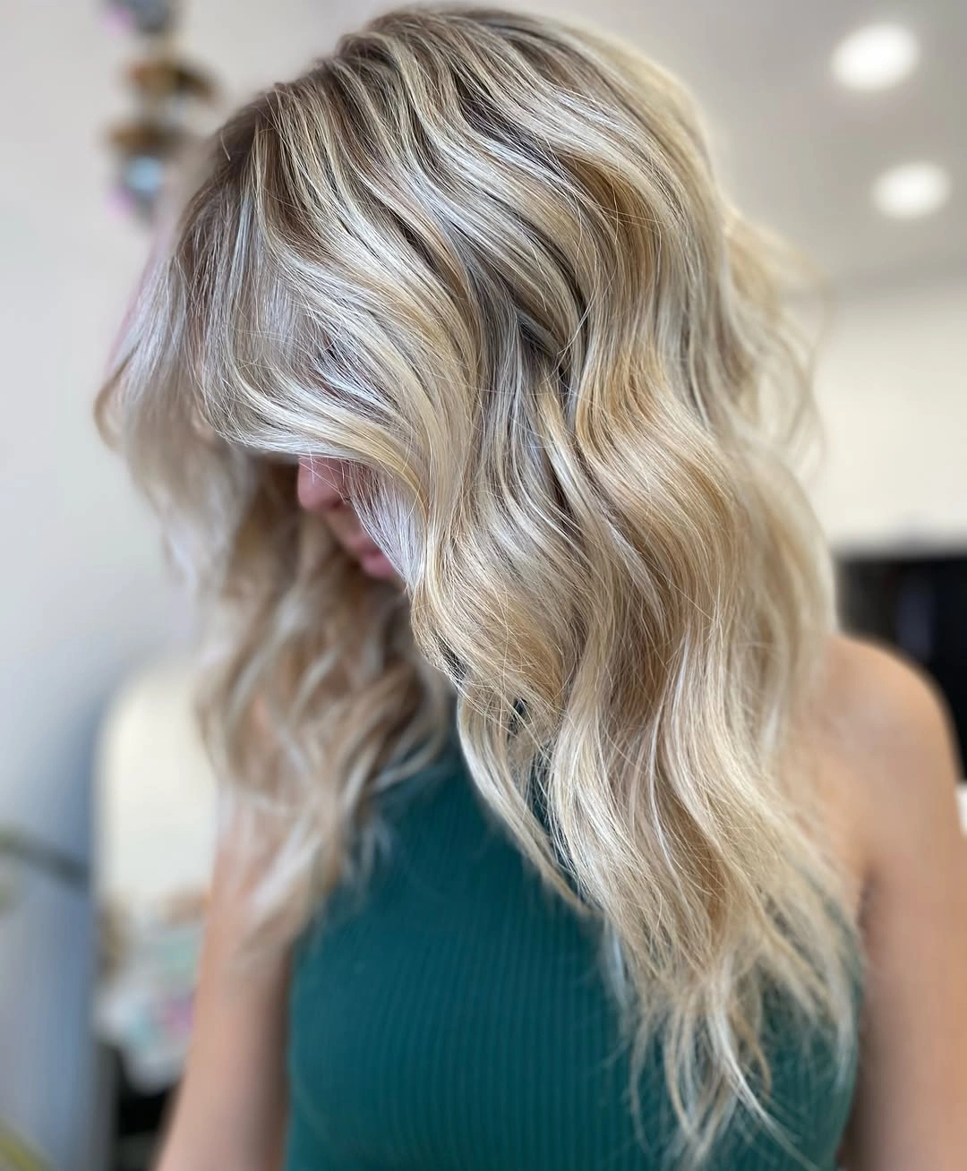 Wavy blonde hair with cool silver beige ribbons