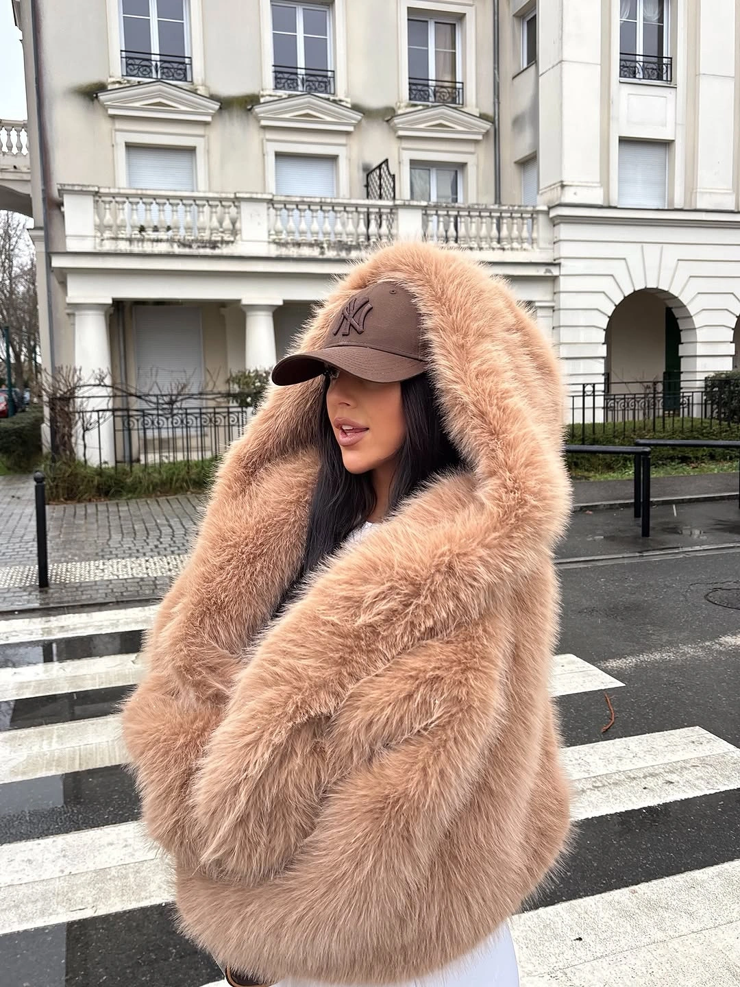 Voluminous tan textured outer layer with brown cap