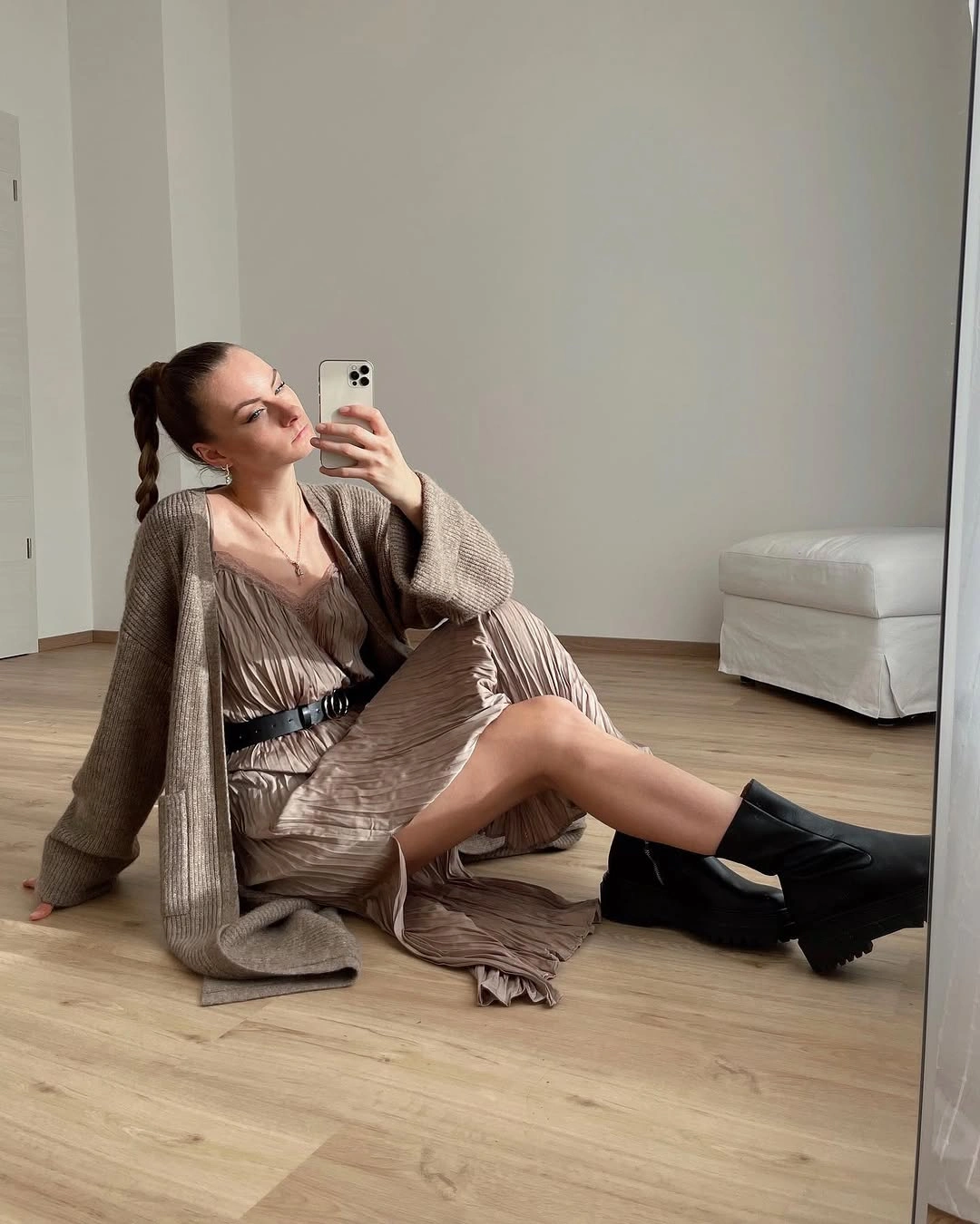Taupe long dress with oversized cardigan and black boots