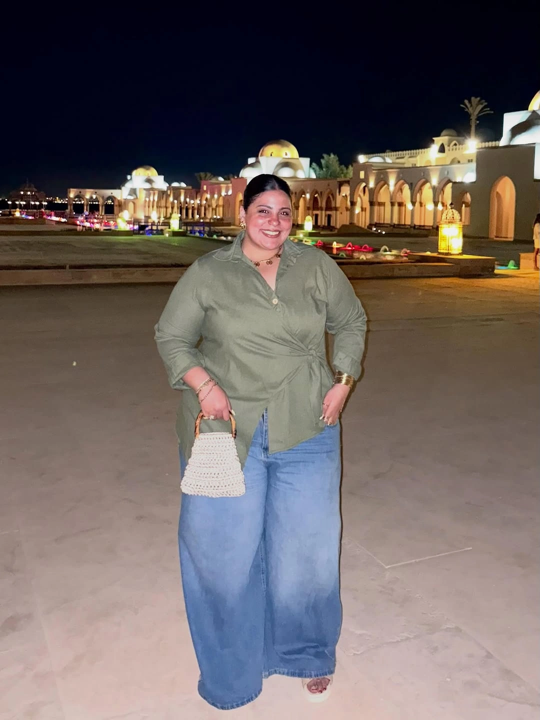 Olive button shirt with pale wide-leg jeans