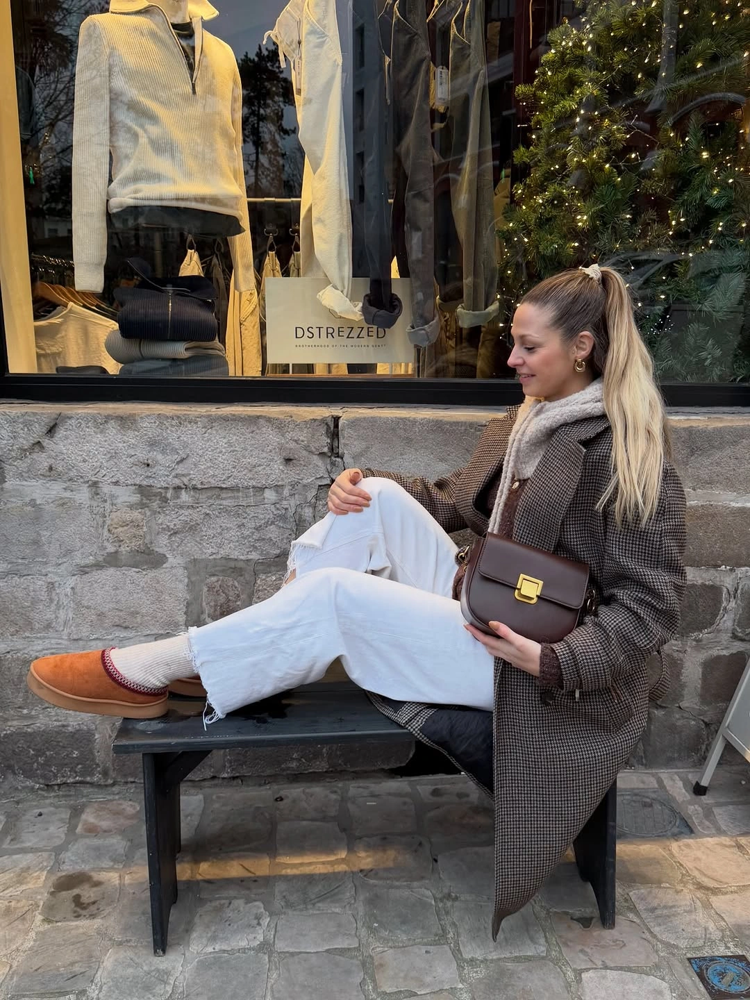 Grey checked blazer with white trousers, tan loafers and brown bag