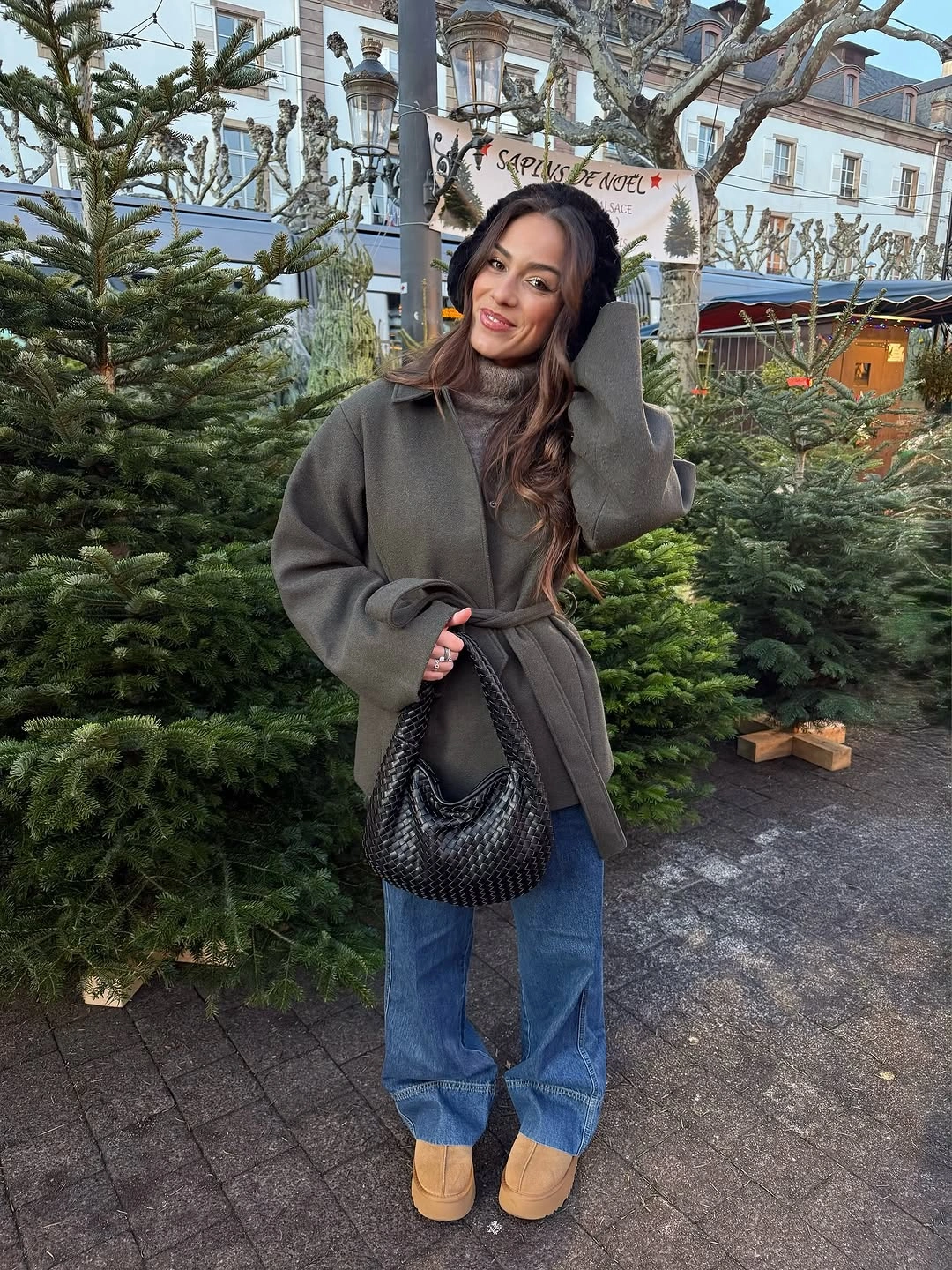 Grey belted coat with jeans, tan footwear and black bag
