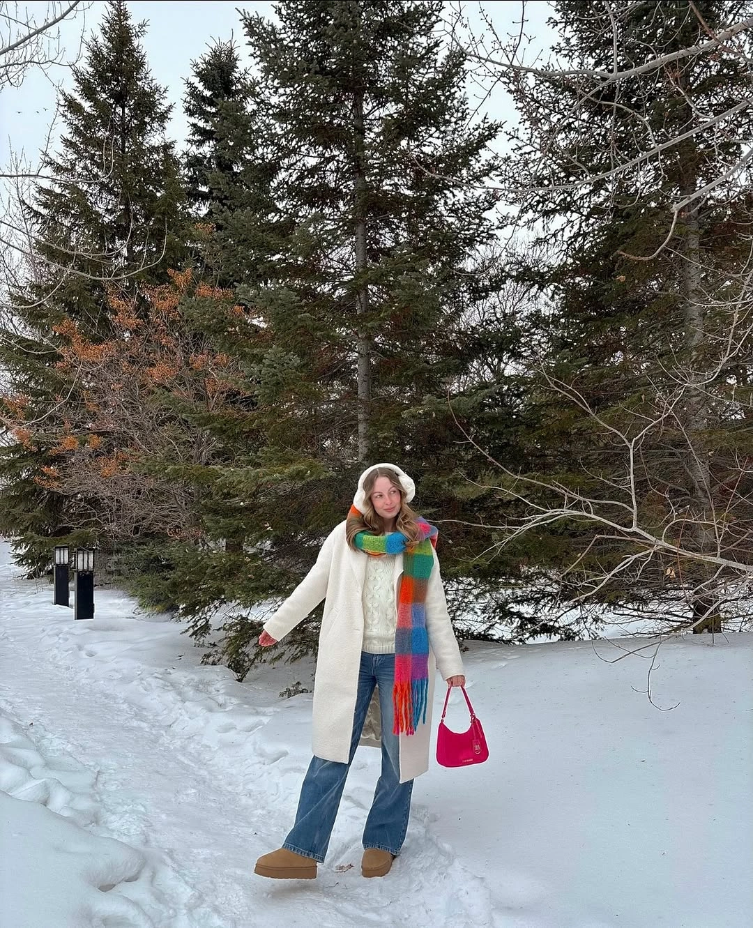 Long ivory coat with jeans, scarf, pink bag and tan boots
