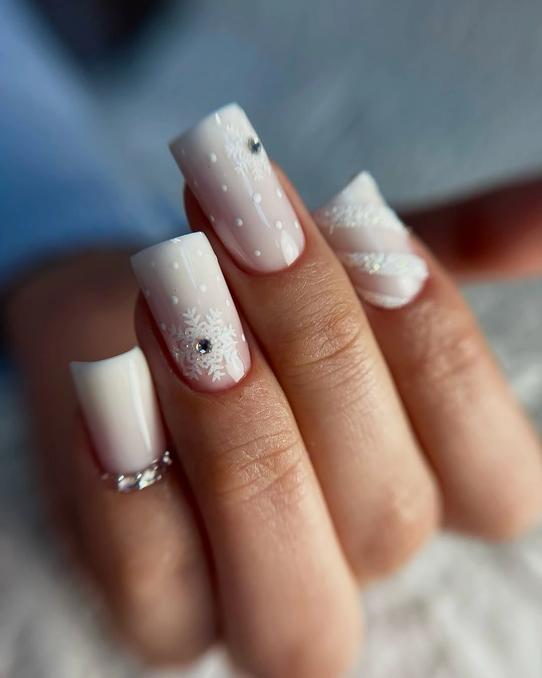 Long white square nails with snowflakes, dots and knit texture