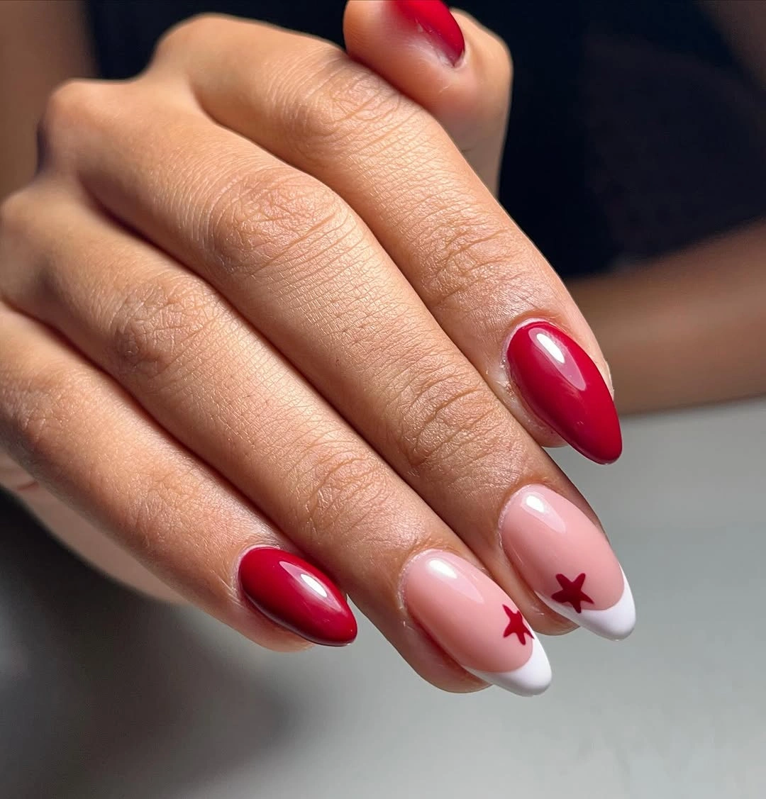 Red almond nails with white French tips and small red bows