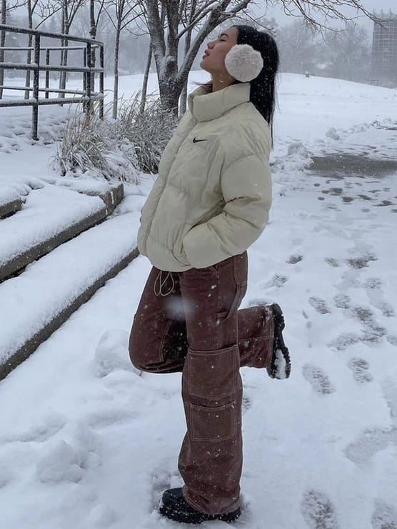 Cream Puffer Jacket with Brown Canvas Pants and Earmuffs — Cute Winter Outfits