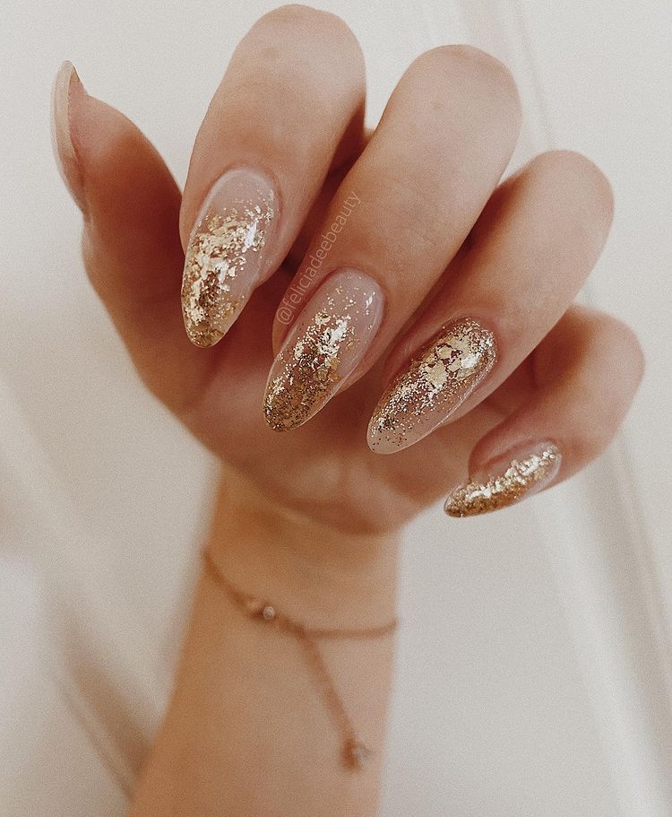 Glossy Glitter Long Almond Abundant Gold Foil Glossy Glitter Long Almond Abundant Gold Foil β Winter Gold Nails
