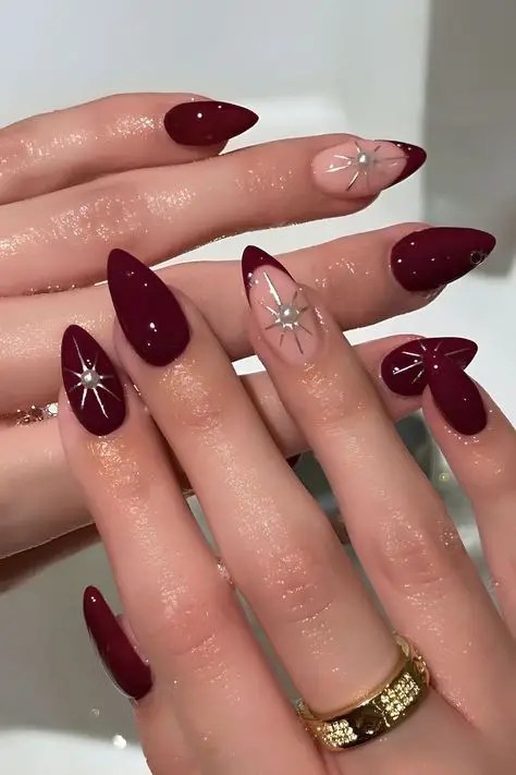 Medium Stiletto French Tips & Starbursts Medium Stiletto French Tips & Starbursts β Wine Christmas Nails 2026