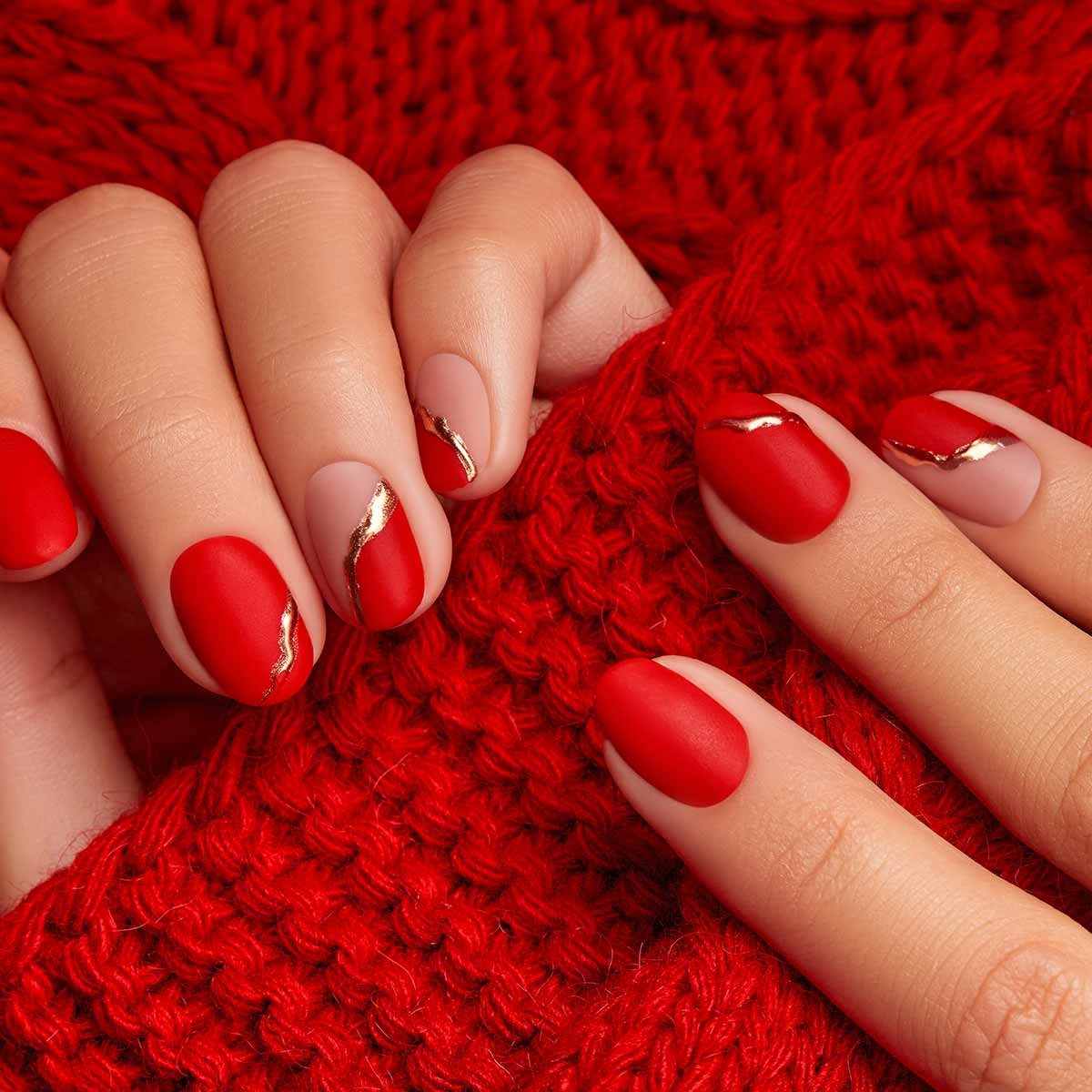 Matte Red and Nude with Wavy Gold Foil Matte Red and Nude with Wavy Gold Foil β Red and Gold Christmas Nails 2026