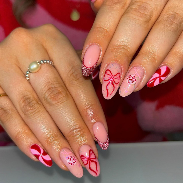 Pink Glitter Bow Peppermint Swirl Nails Pink Glitter Bow Peppermint Swirl Nails β Medium Christmas Nails 2026