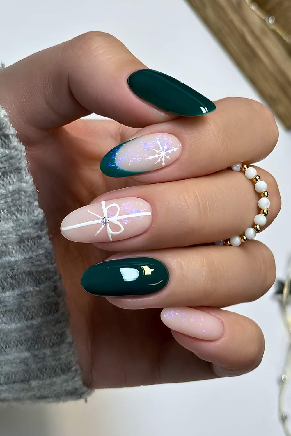 Almond Nails with Sheer Pink Art and Deep Green Solids — Green Christmas Nails 2026