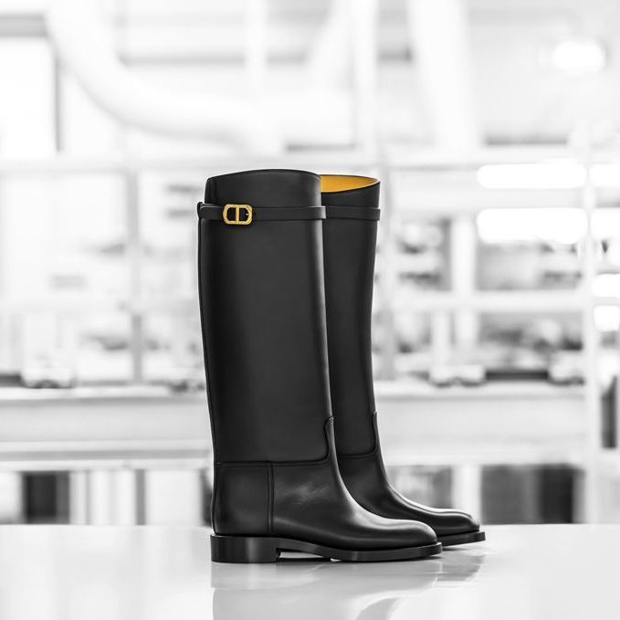 Detail Focus: Black Leather Riding Boots with Gold Buckle Detail Focus: Black Leather Riding Boots with Gold Buckle β Riding Boots Outfits