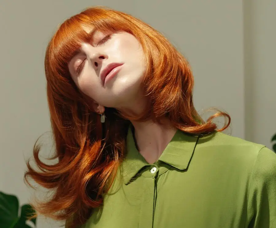 Bright Copper Bob With Feathered Bangs Bright Copper Bob With Feathered Bangs β Winter Hair Colors for Redheads