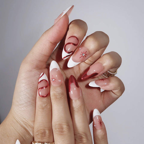 Long Stiletto Pink Base Red Swirls & Gems Long Stiletto Pink Base Red Swirls & Gems β New Years Nails 2027