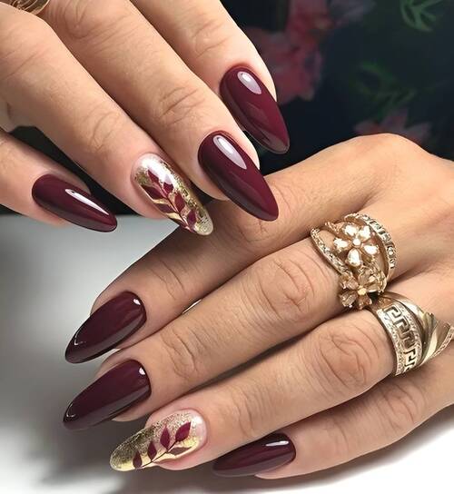 Long Almond Burgundy with Gold Leaf Motif Long Almond Burgundy with Gold Leaf Motif β Burgundy Christmas Nails 2026