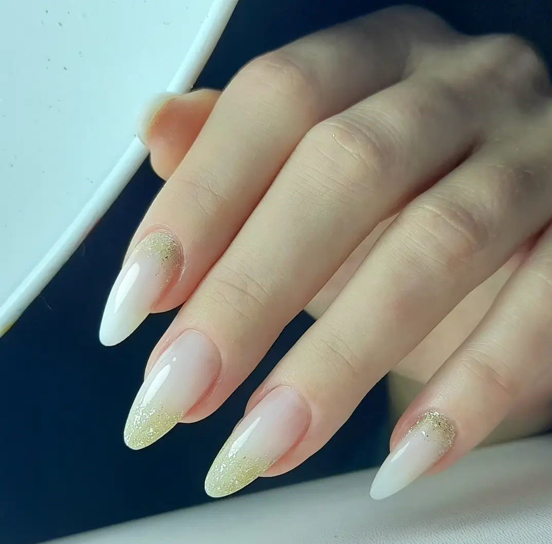French Manicure with Gold Glitter Gradient French Manicure with Gold Glitter Gradient β New Years Nail Colors 2027