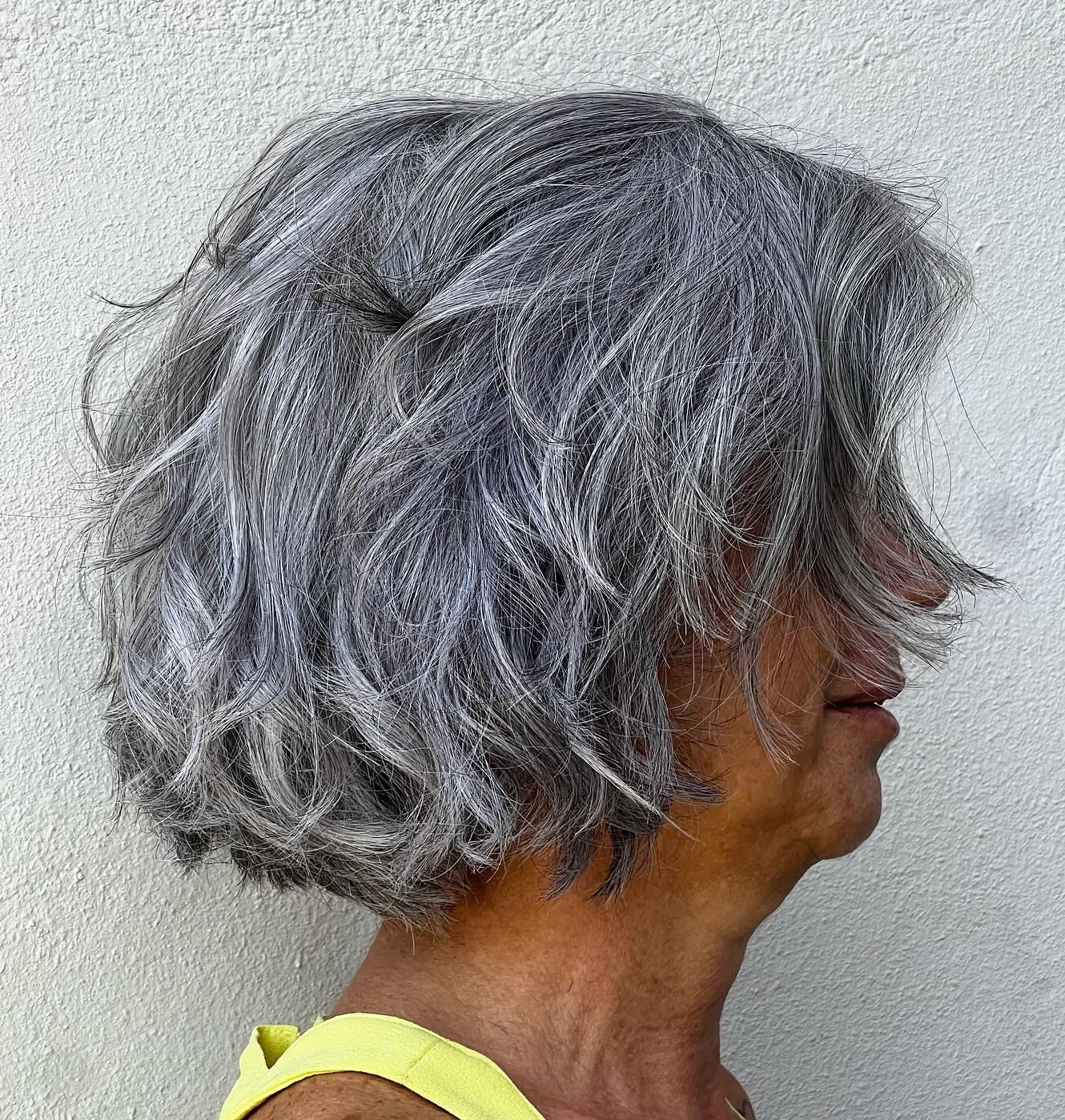 Choppy Grey Shag Bob With Wispy Bangs — Winter Haircuts for Women Over 60