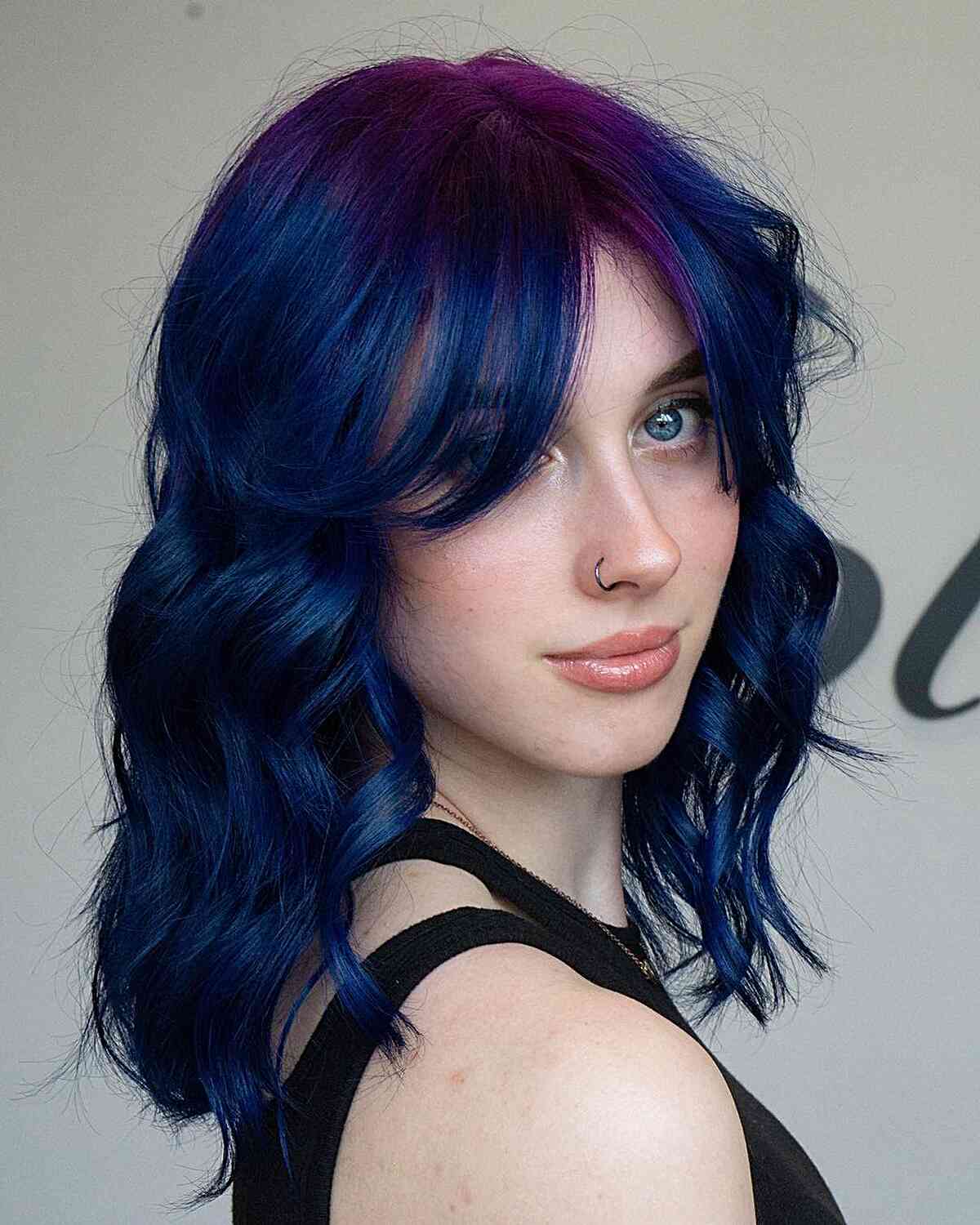 Collarbone Deep Blue With Purple Undertones Collarbone Deep Blue With Purple Undertones β Winter Hair Colors for Blue Eyes