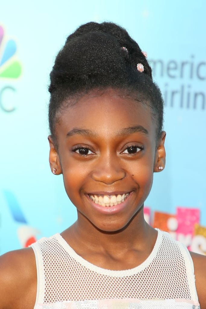 Decorated High Updo With Crown Beads Decorated High Updo With Crown Beads β Winter Hairstyles for Black Kids