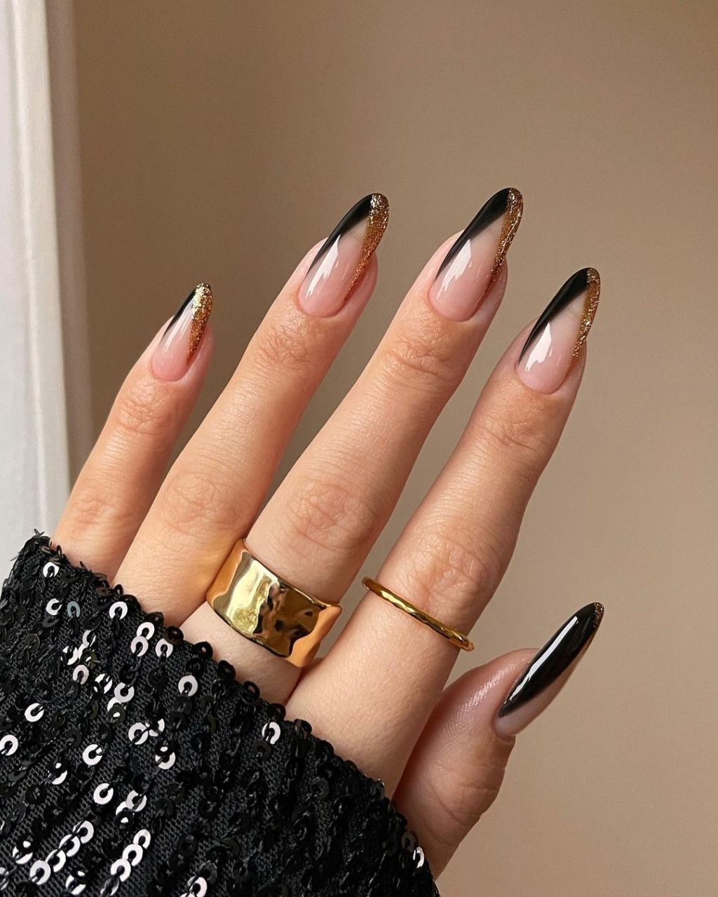 Nude Stiletto with Gold Glitter French Tip — New Years Gel Nails 2027