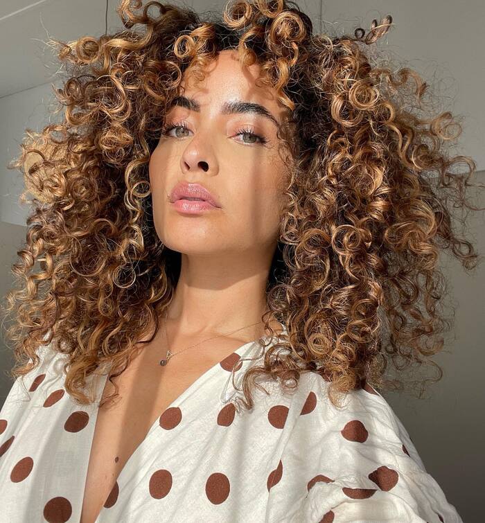 Warm Honey Blonde With Natural Curls — Low Maintenance Winter Hair Colors