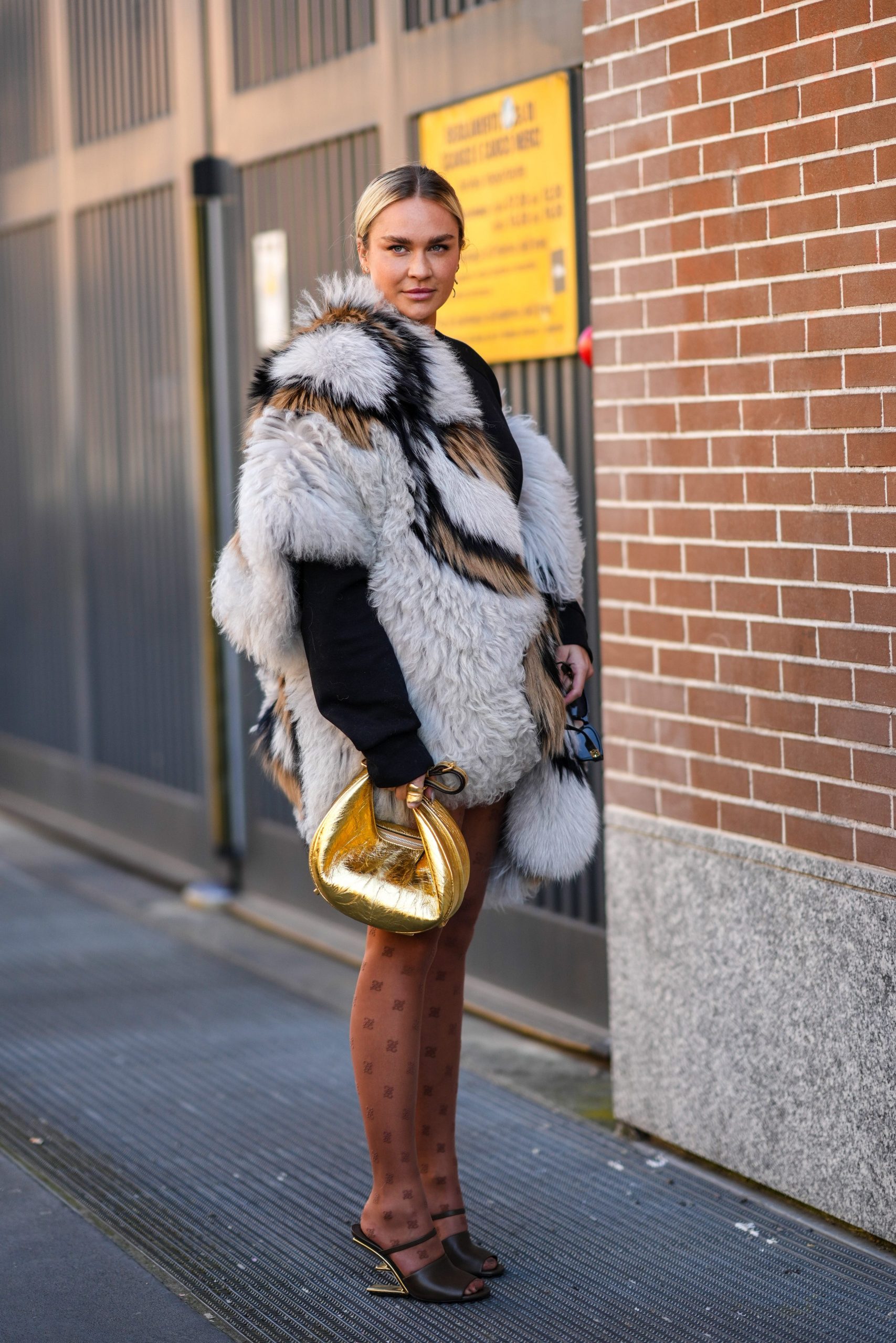 Statement Faux Fur Vest Over a Black Top — February Outfits