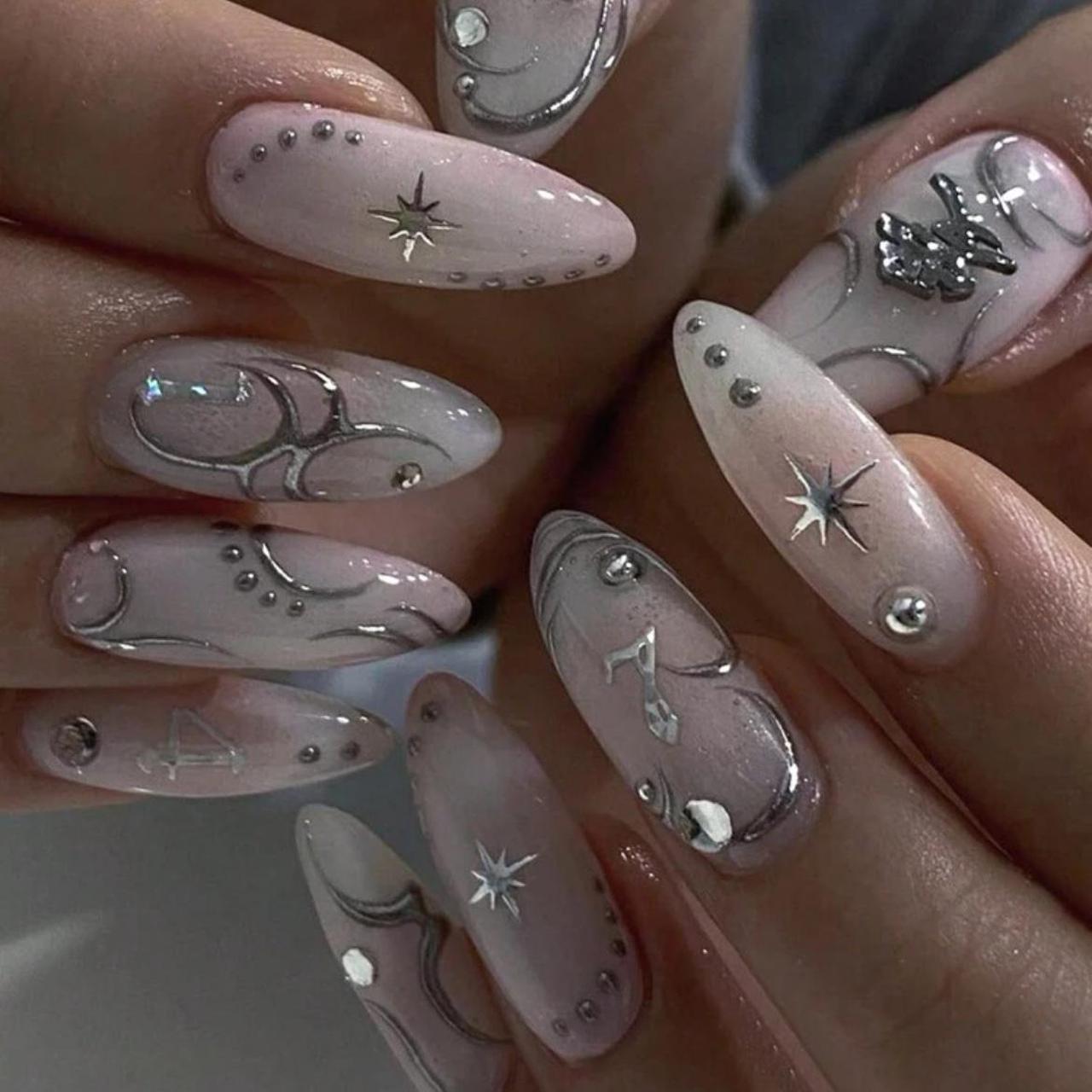 Pale Pink with Intricate Silver Swirls Pale Pink with Intricate Silver Swirls β Long Winter Almond Nails