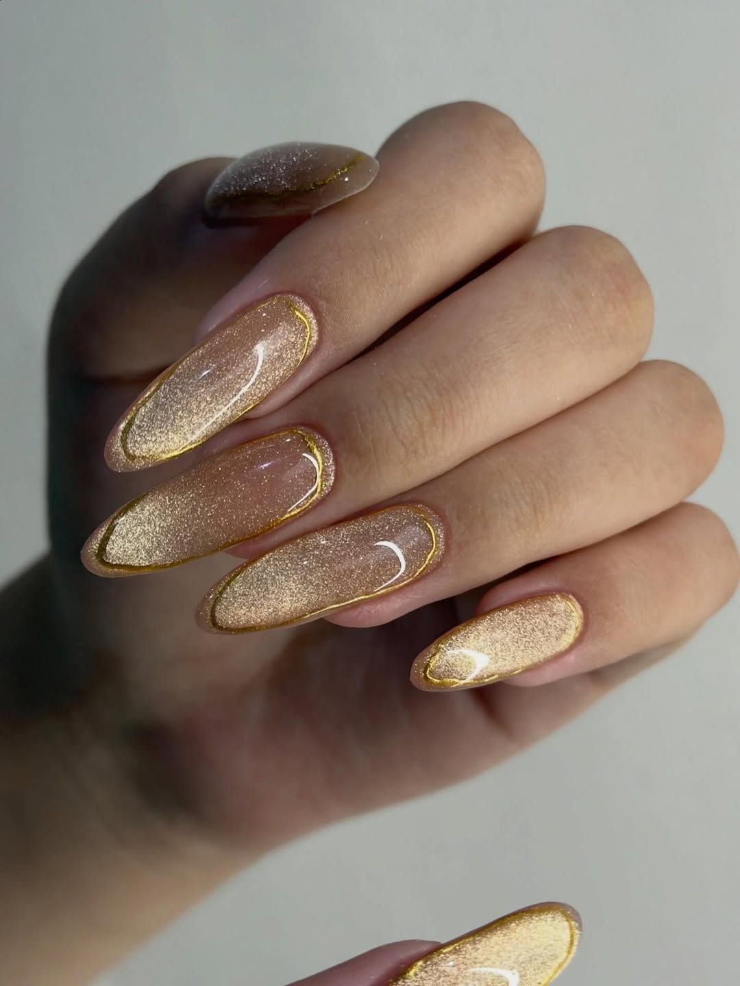 Champagne Cat-Eye Coffin with Gold Foil Champagne Cat-Eye Coffin with Gold Foil β New Years Acrylic Nails 2027