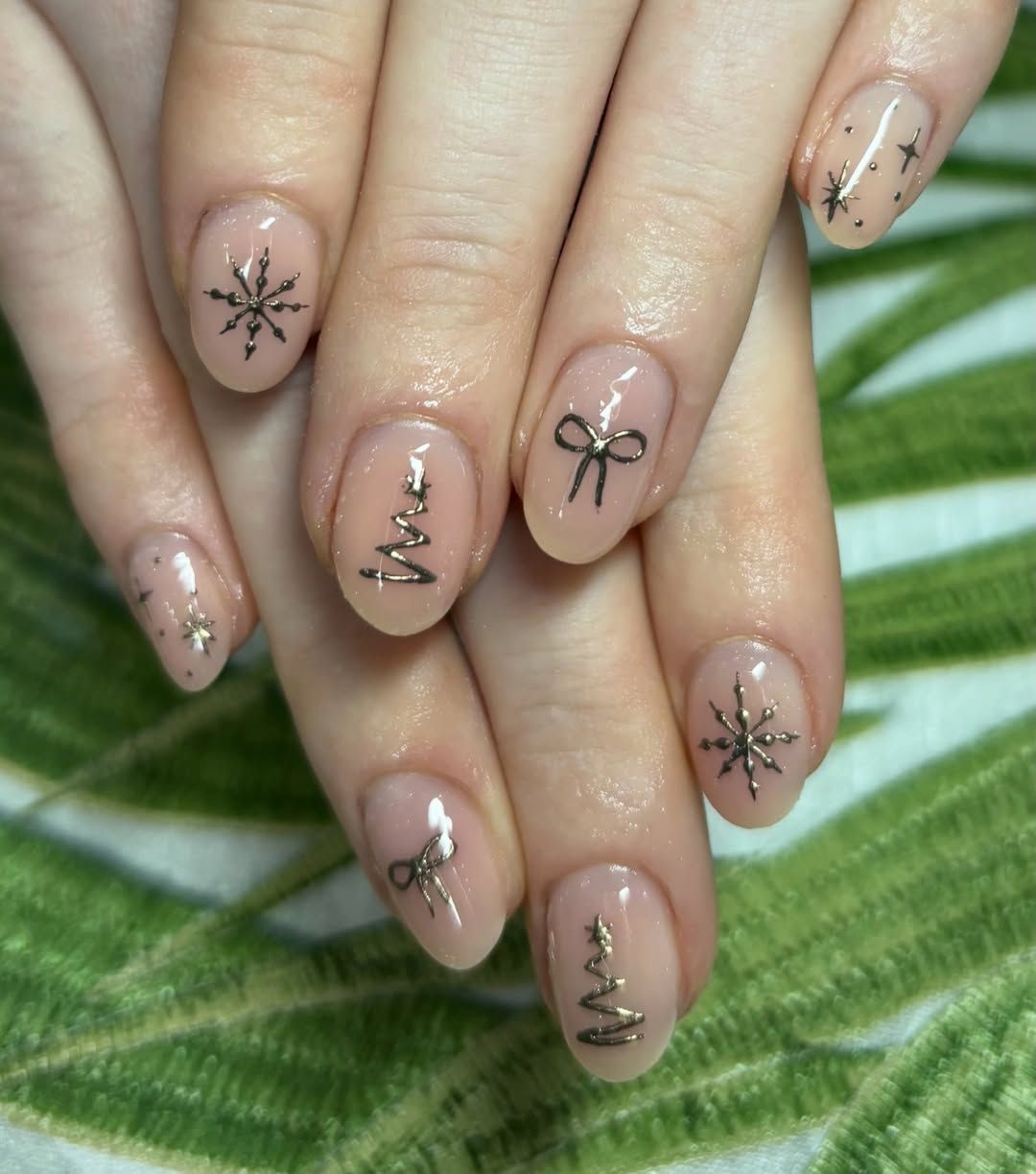 Sheer Nude Gold Foil Christmas Accents Sheer Nude Gold Foil Christmas Accents β Medium Christmas Nails 2026