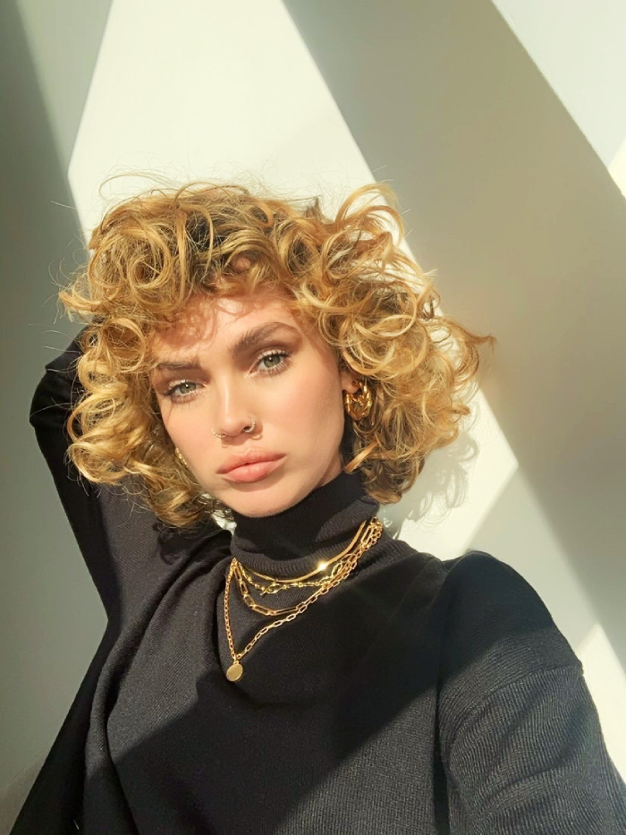 Layered Bob With Curtain Bangs — Winter Haircuts for Curly Hair