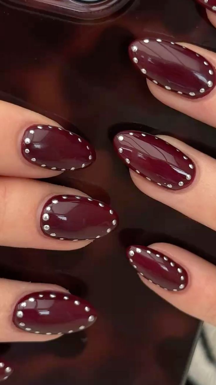 Medium Oval Burgundy Studded Cuticle Medium Oval Burgundy Studded Cuticle β Wine Christmas Nails 2026