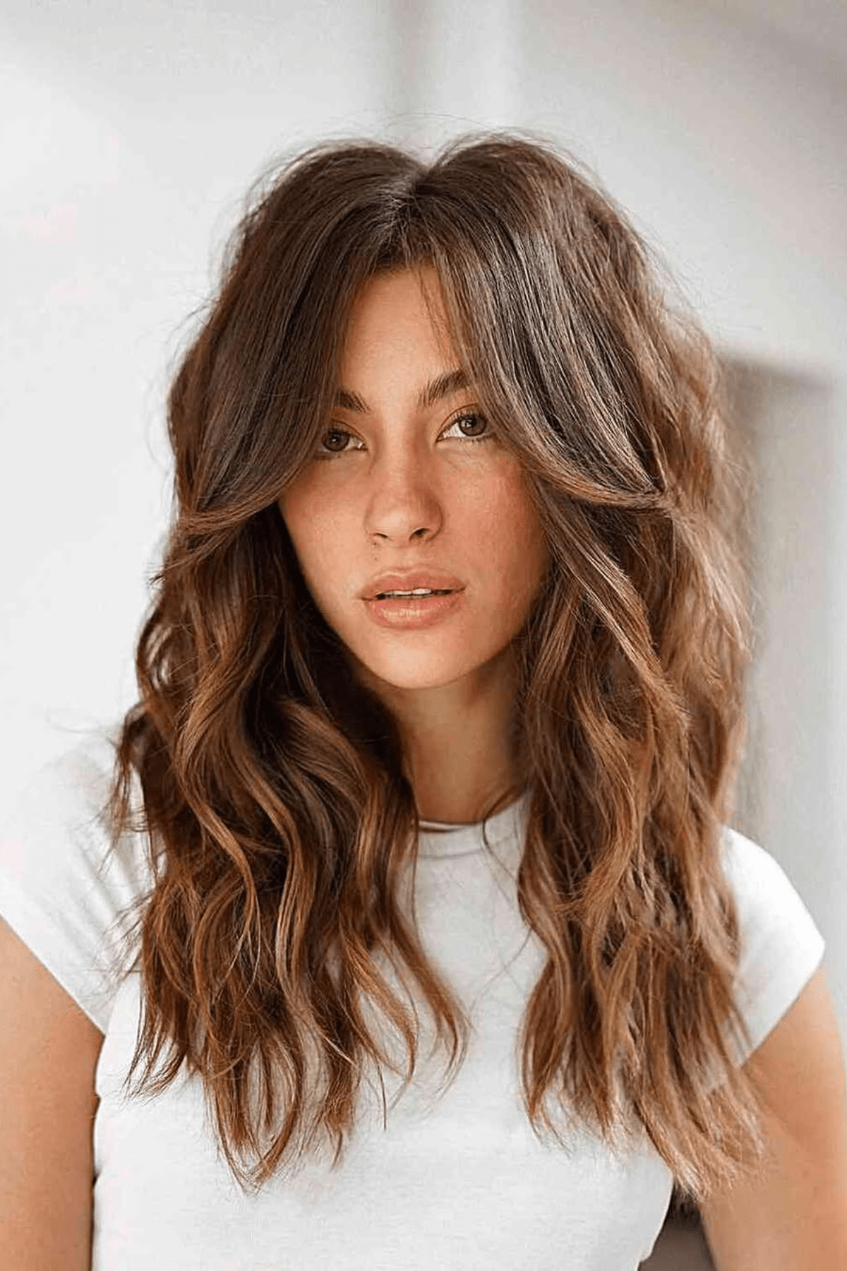 Mid-Back Layers with Natural Waves — Winter Haircuts for Wavy Hair