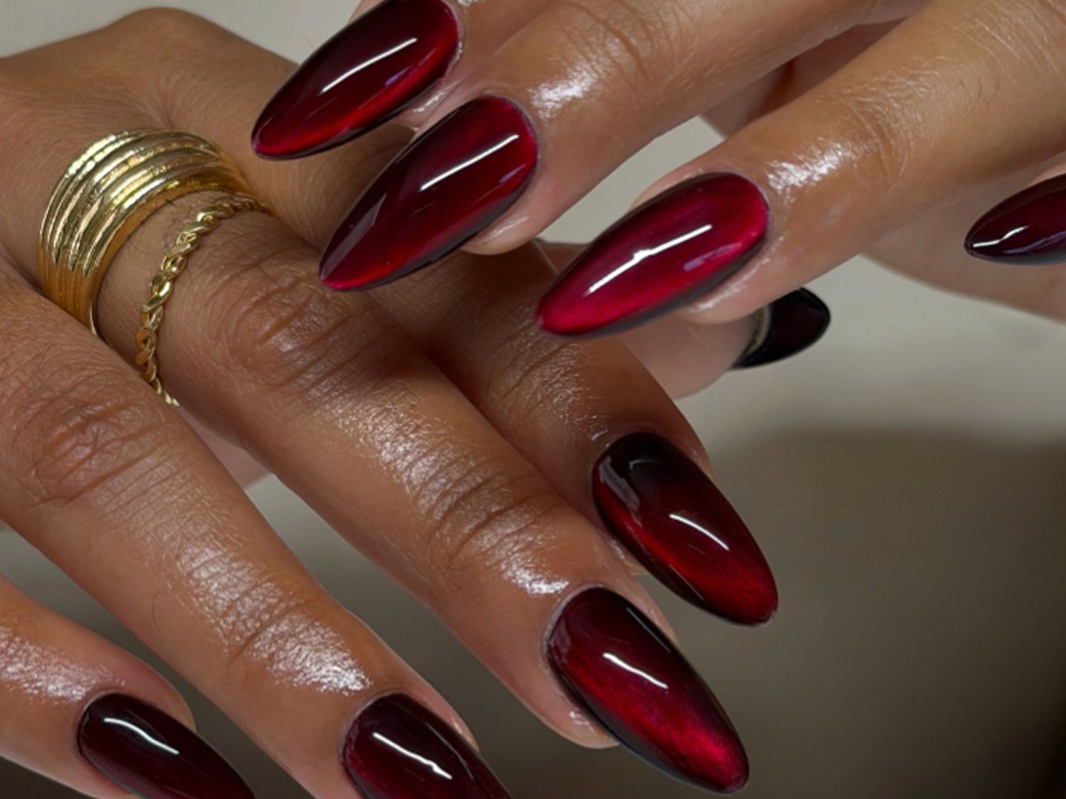 Deep Burgundy Cat-Eye Stilettos Deep Burgundy Cat-Eye Stilettos β Christmas Nails for Women Over 50 2026